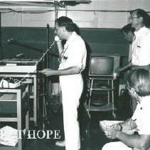 Dr. Daniel Verne talking to Washington via COMSAT with Kim Kaiser.